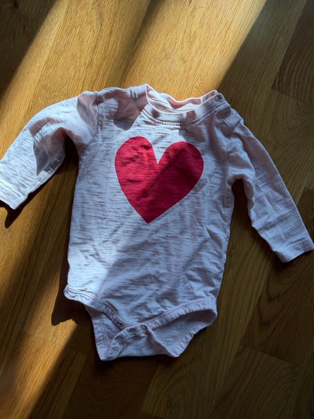Primary Light Pink Long-Sleeve Bodysuit with Red Heart
